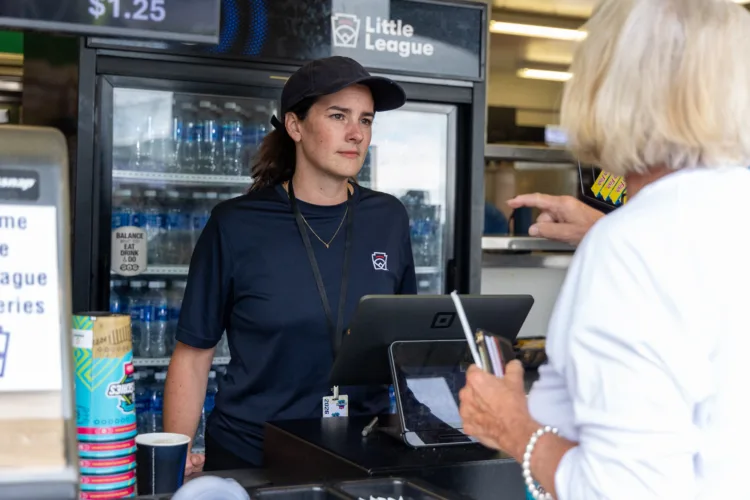Candidate for U.S. Congress volunteers for Ronald McDonald House at Little League World Series